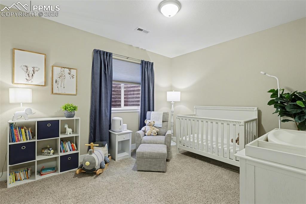 Image 23 of 36: Bedroom