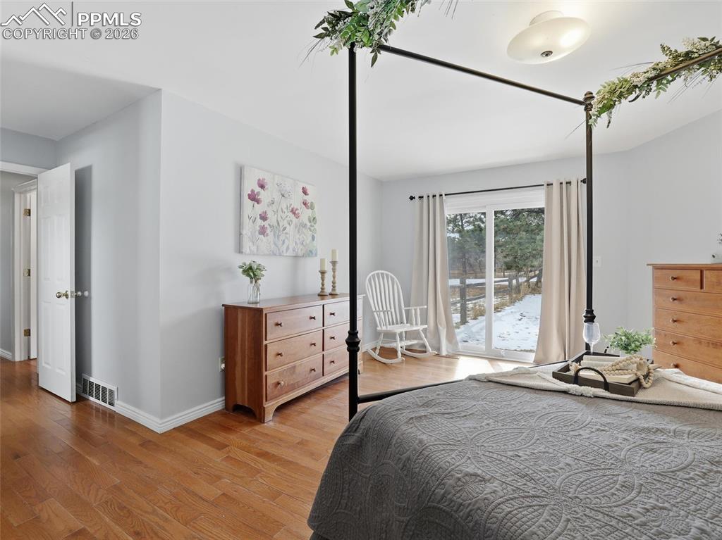 Image 23 of 50: Master Bedroom