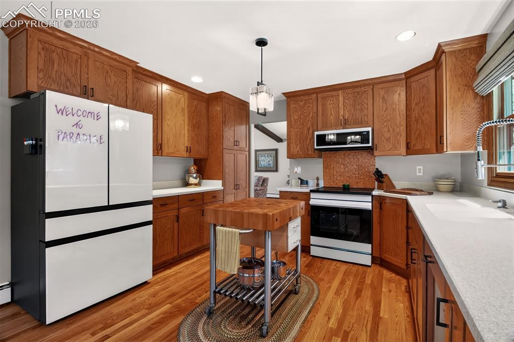 Image 13 of 50: Flowing from the living room into the open concept dining area 