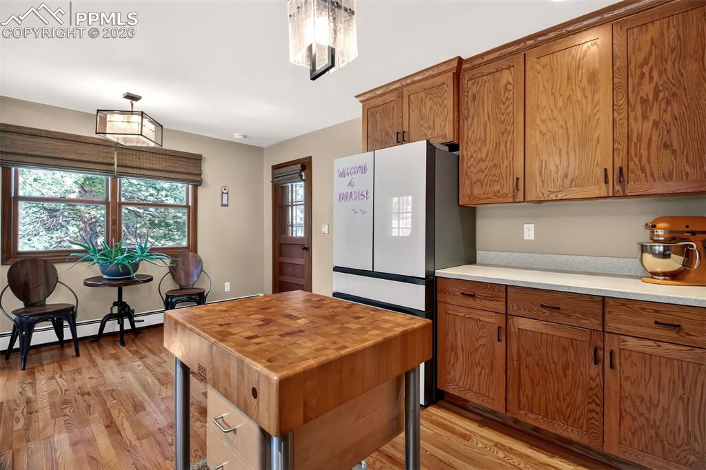 Image 16 of 50: Newer renovated kitchen with a John boos maple butcher black, Samsung bespo