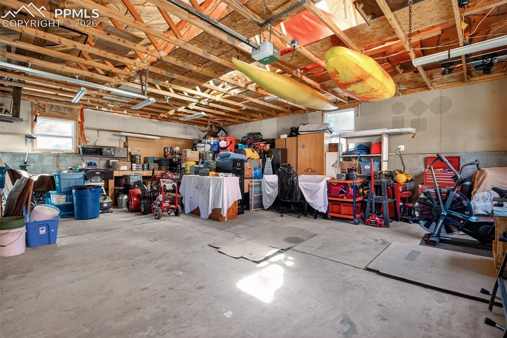 Image 36 of 50: Oversized 1 car attached garage