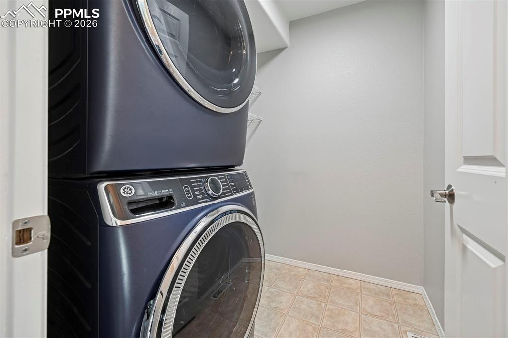 Image 14 of 49: Laundry room with included washer and dryer, can be stackable or side-by-si