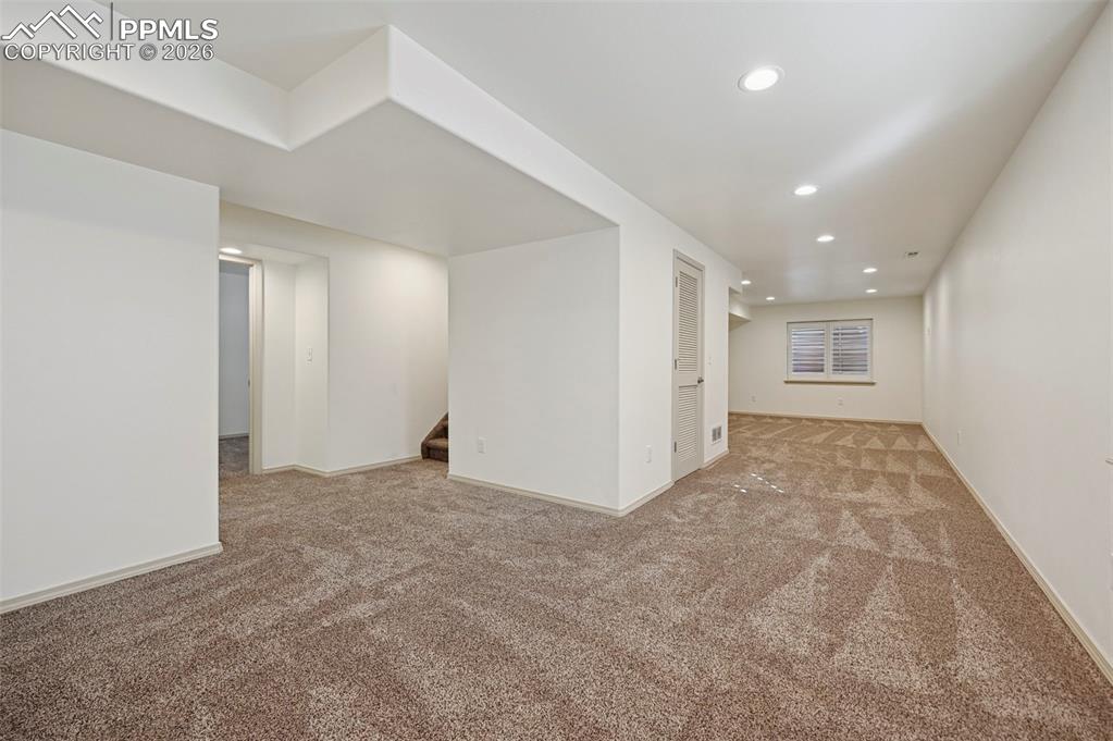 Image 31 of 49: Unstaged basement ready for your family room, game room, or theater room!