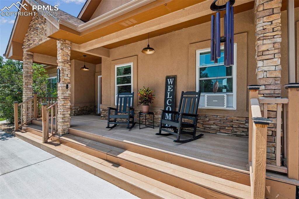 Image 10 of 49: Cute Front Porch, Perfect for Sipping Coffee and Enjoying the Peaceful Coun