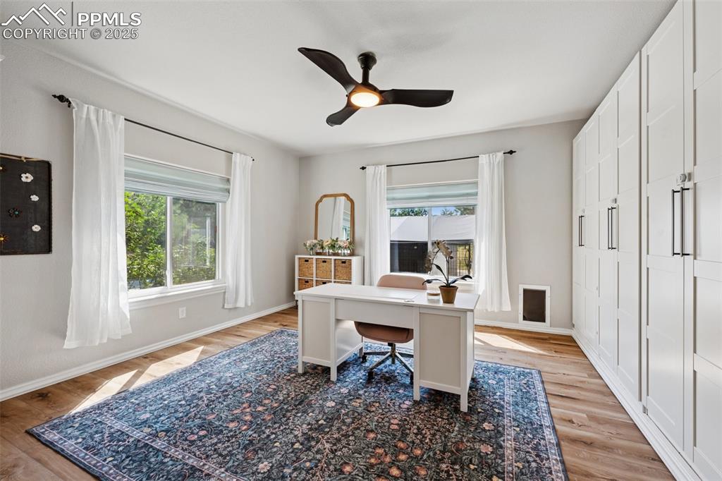 Image 14 of 49: Large Office w/ Cabinets Included