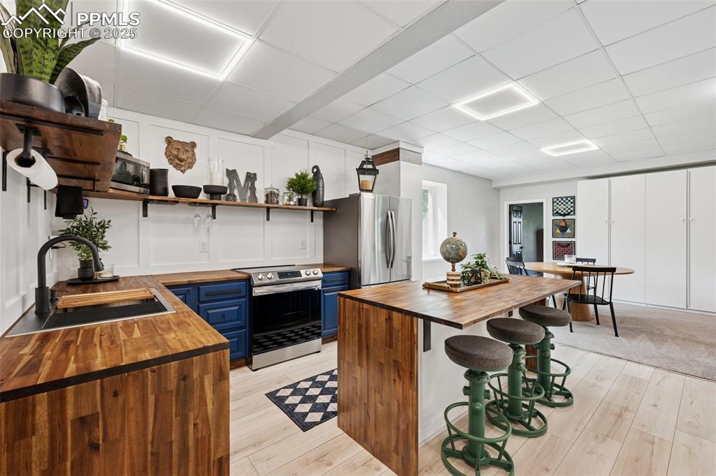 Image 27 of 49: Downstairs Full Kitchen