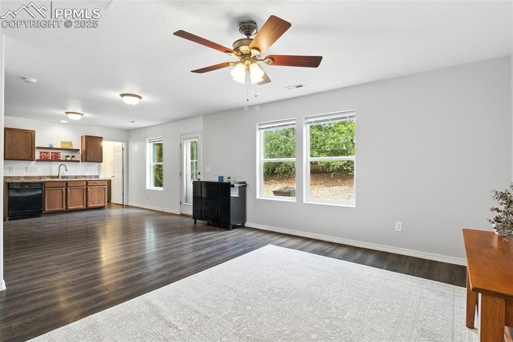 Image 10 of 36: Looking through dining room to kitchen.