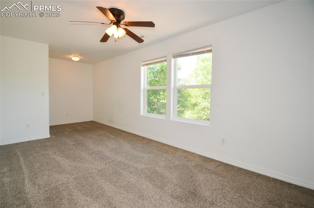Image 18 of 36: Looking into loft from stairs.