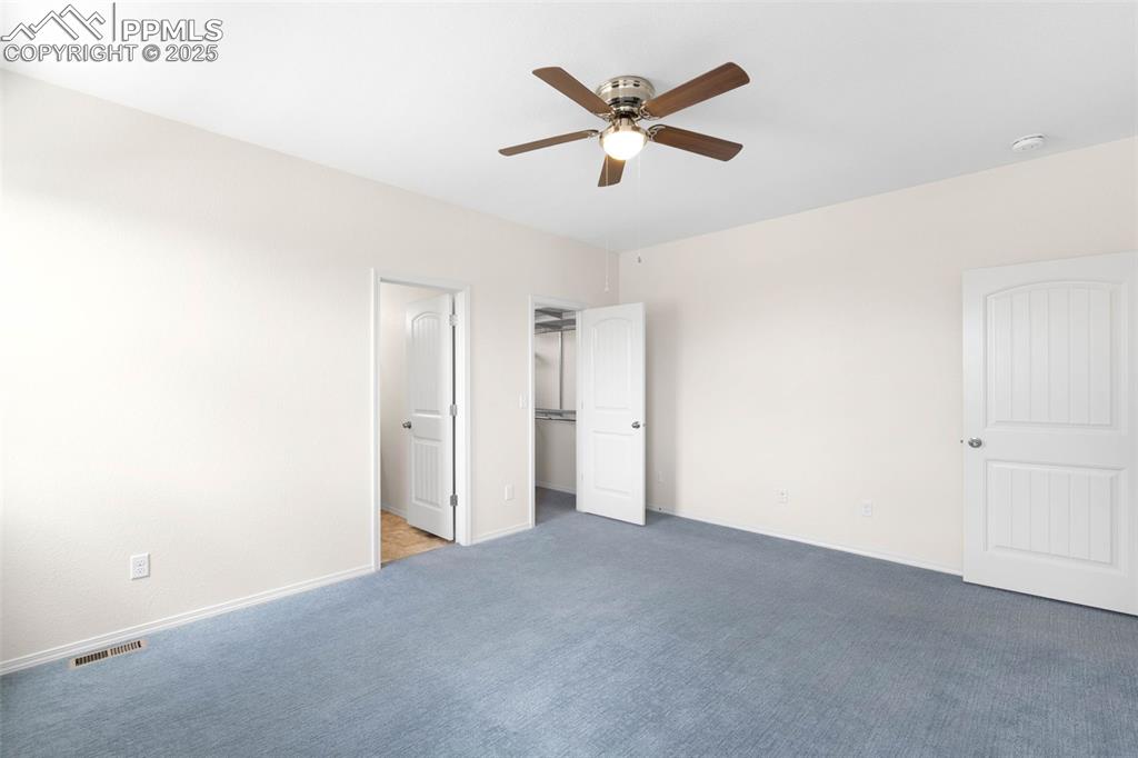 Image 13 of 37: Unfurnished primary bedroom