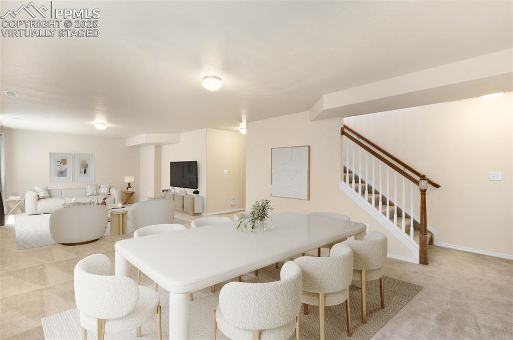 Image 21 of 37: Virtually Staged. Basement living area