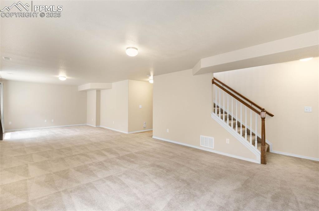 Image 22 of 37: Basement living area