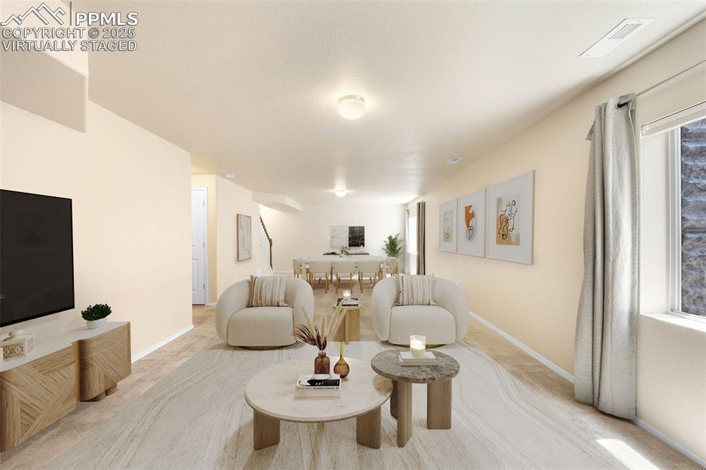 Image 23 of 37: Virtually Staged. Basement living area