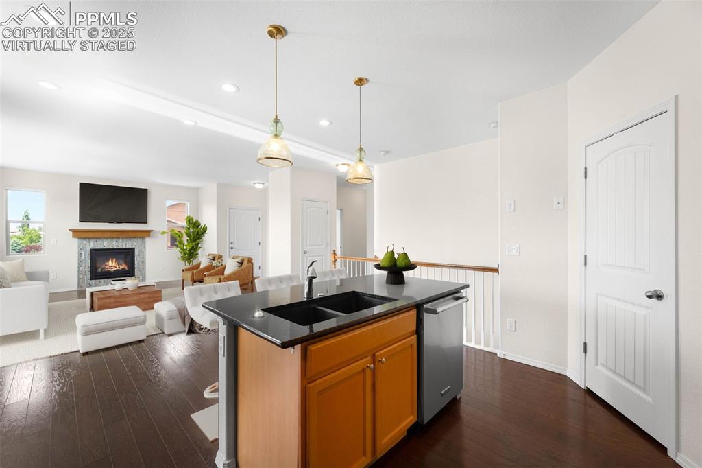 Image 7 of 37: Virtually Staged. Kitchen and living room