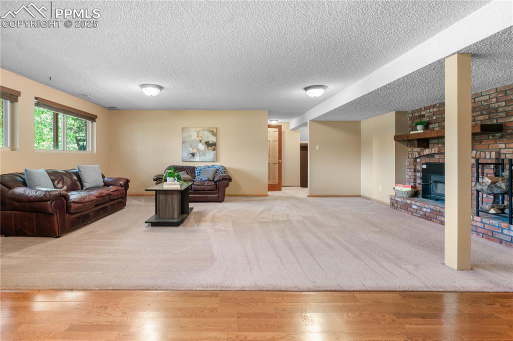Image 25 of 44: Huge rec room in lower level