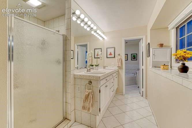 Image 15 of 49: Primary bath 