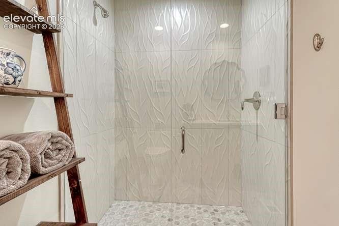 Image 30 of 49: Updated 3/4 bath with walk in shower