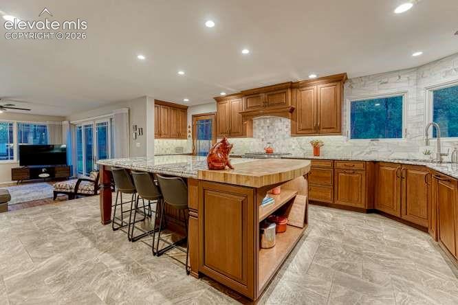 Image 4 of 49: High end, gourmet kitchen with bar seating for 6