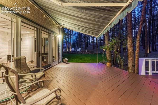 Image 43 of 49: deck with awning extended