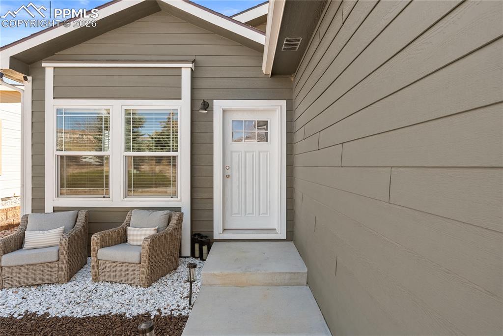 Image 3 of 31: Front door & patio 