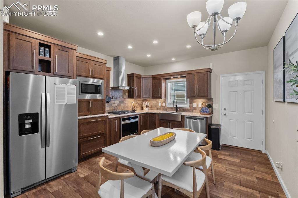 Image 8 of 31: open kitchen and dining room