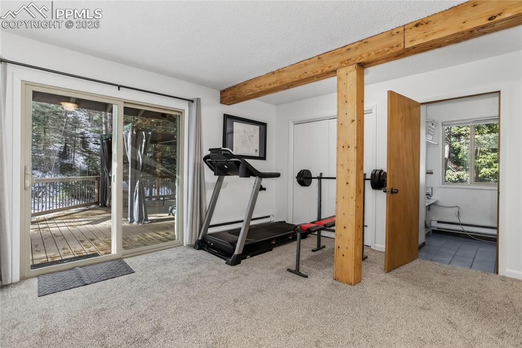 Image 32 of 50: Lower level flex room.