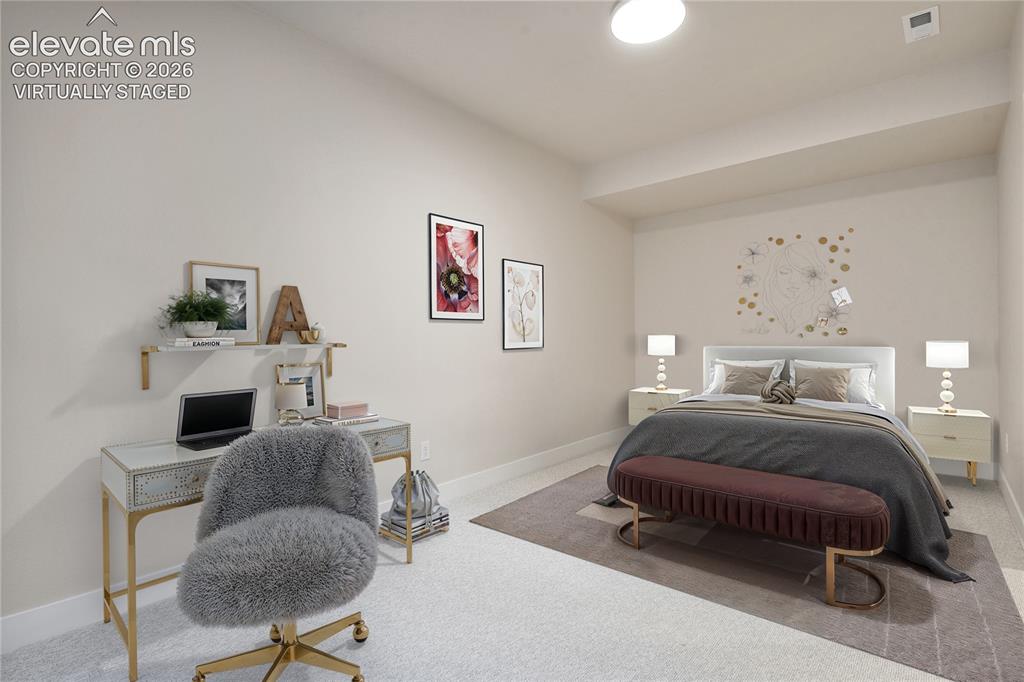 Image 24 of 50: Lower level Fourth bedroom with walk-in closet. Virtually Staged