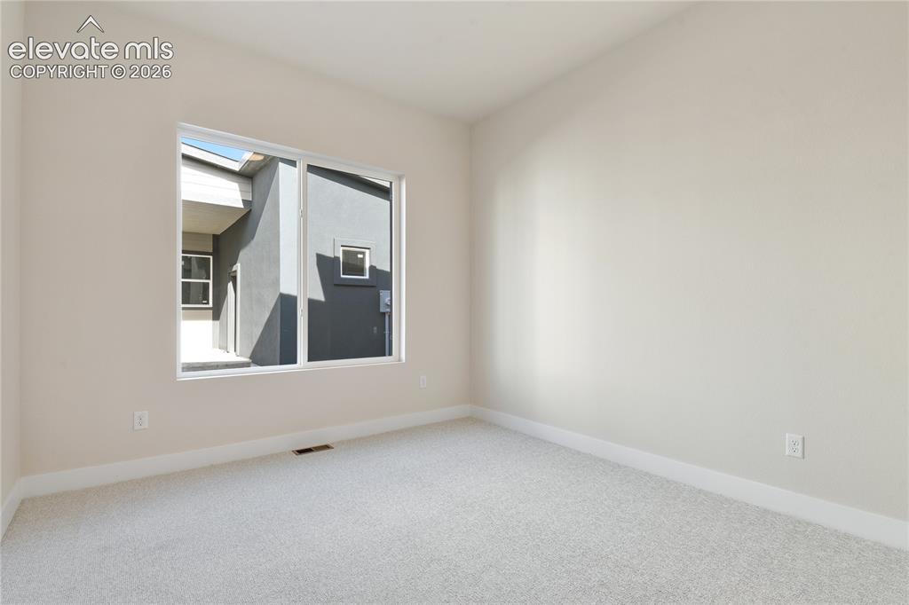 Image 44 of 50: Second main level bedroom