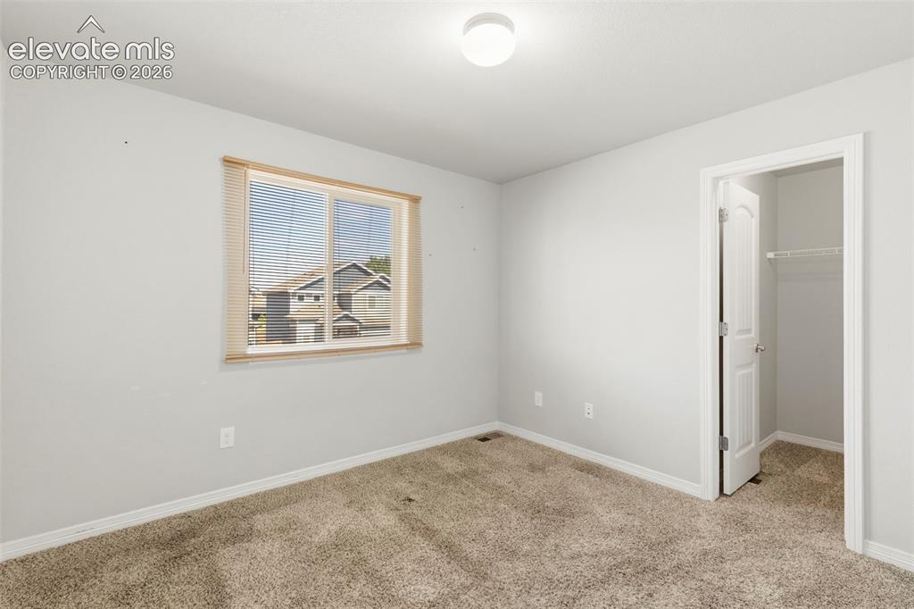 Image 32 of 38: 3rd bedroom