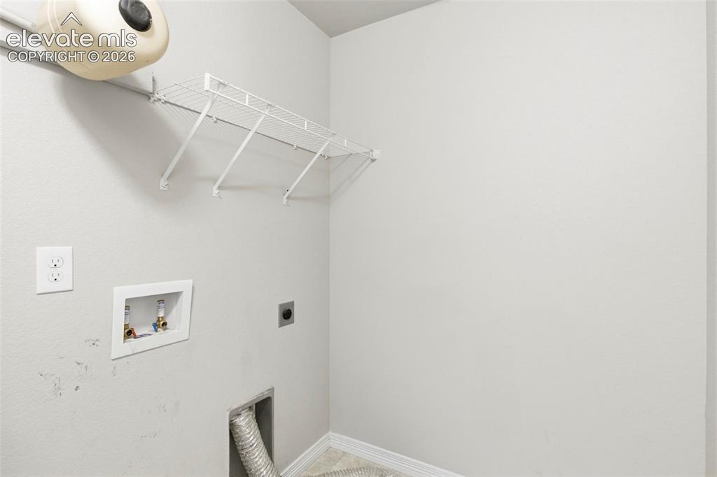 Image 33 of 38: Laundry room