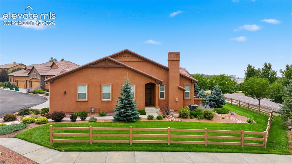 Image 2 of 37: End unit providing more luscious, maintenance free, landscaping around the