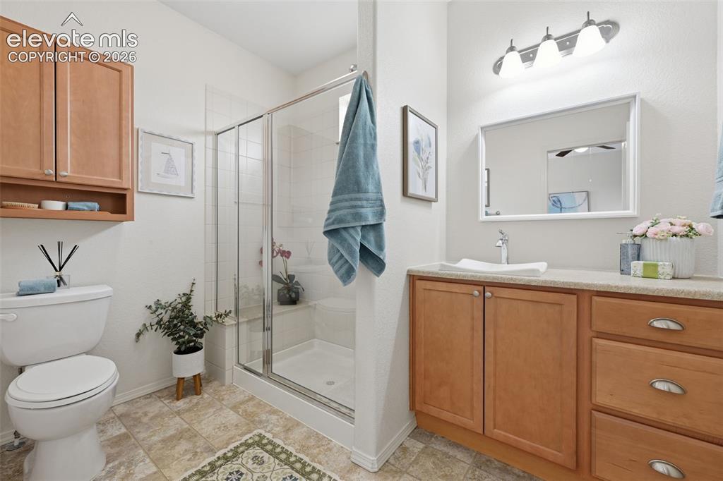 Image 23 of 37: Primary ensuite 3/4 bathroom adjoining primary bedroom.