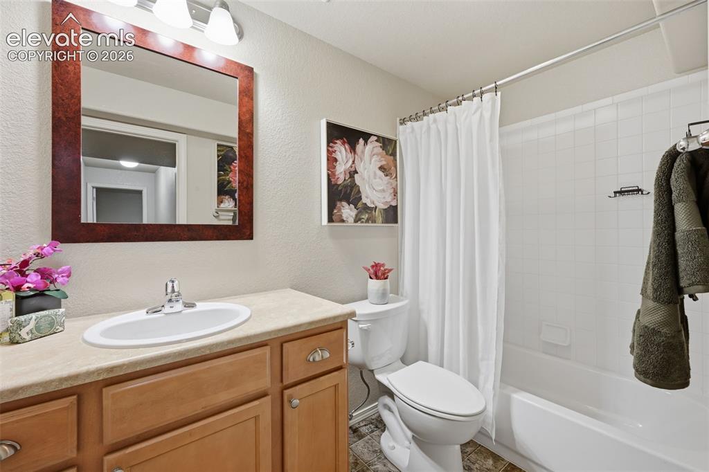 Image 27 of 37: Basement Full bathroom to serve the two additional large bedrooms in the ba