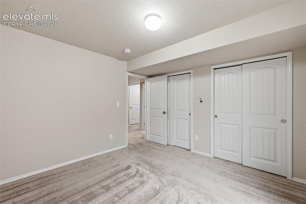 Image 28 of 37: 1st large basement bedroom 