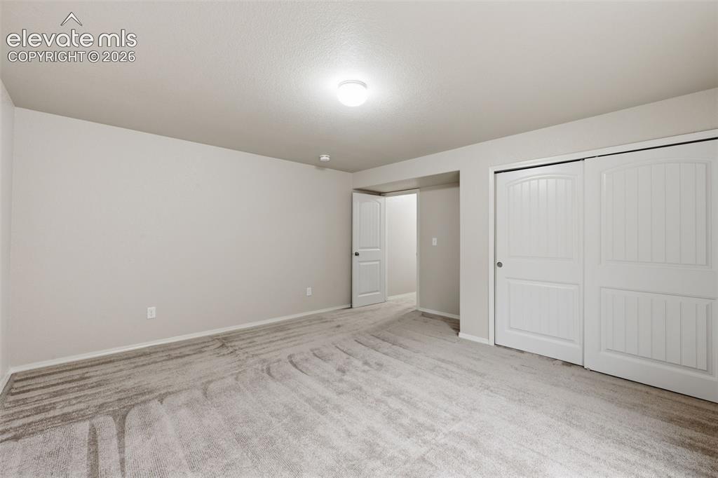 Image 31 of 37: Second Large Basement bedroom.