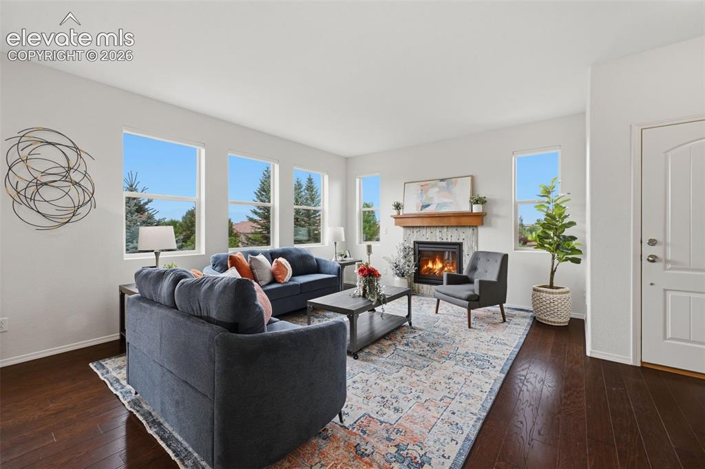 Image 7 of 37: View of cosy gas fireplace for the cooler Fall and winter evening and the e