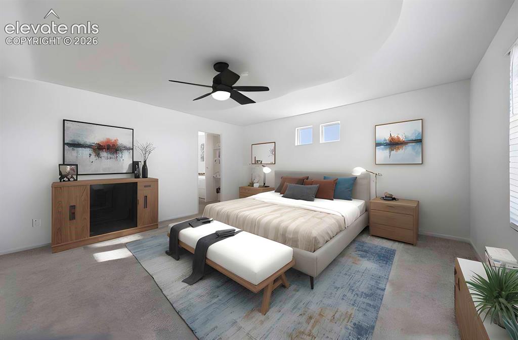 Image 12 of 15: Recessed ceiling feature, neutral wall tones, two transom windows, ceiling