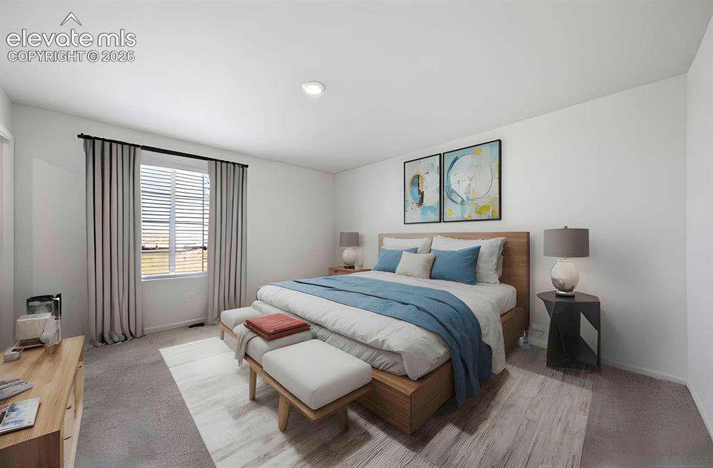 Image 3 of 15: Spacious room with white walls and a large window featuring blinds and drap