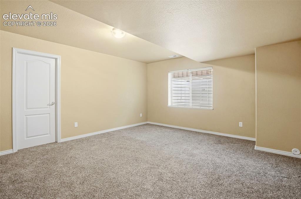 Image 30 of 41: Another oversized bedroom with a walk-in closets - spacious, comfortable an