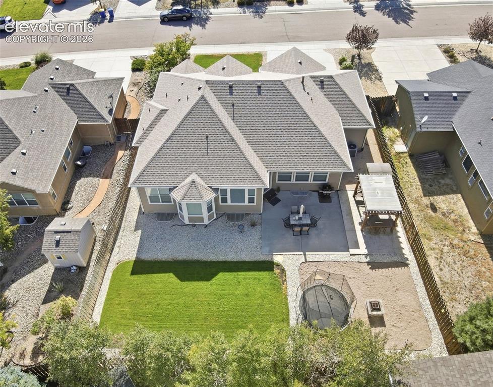 Image 39 of 41: Open yard space with room to play and relax.