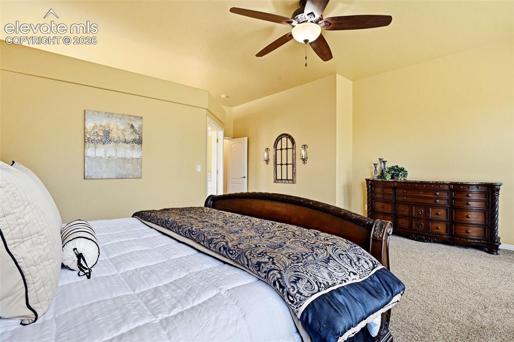 Image 9 of 41: Spacious primary suite with room for a full king set, integrated light/ceil