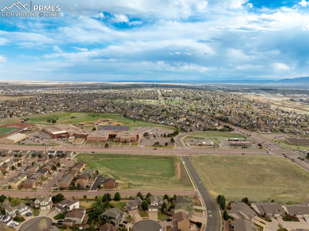 Image 24 of 24: View of property location with nearby suburban area