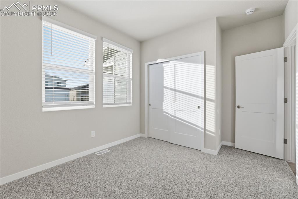 Image 14 of 16: Bedroom