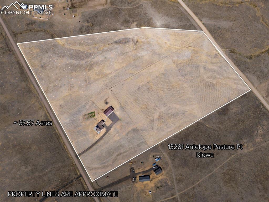 Image 46 of 49: Aerial view of the property with approximately 37.57 acres of land