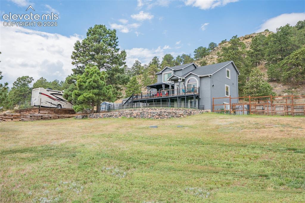 Image 10 of 47: View of yard