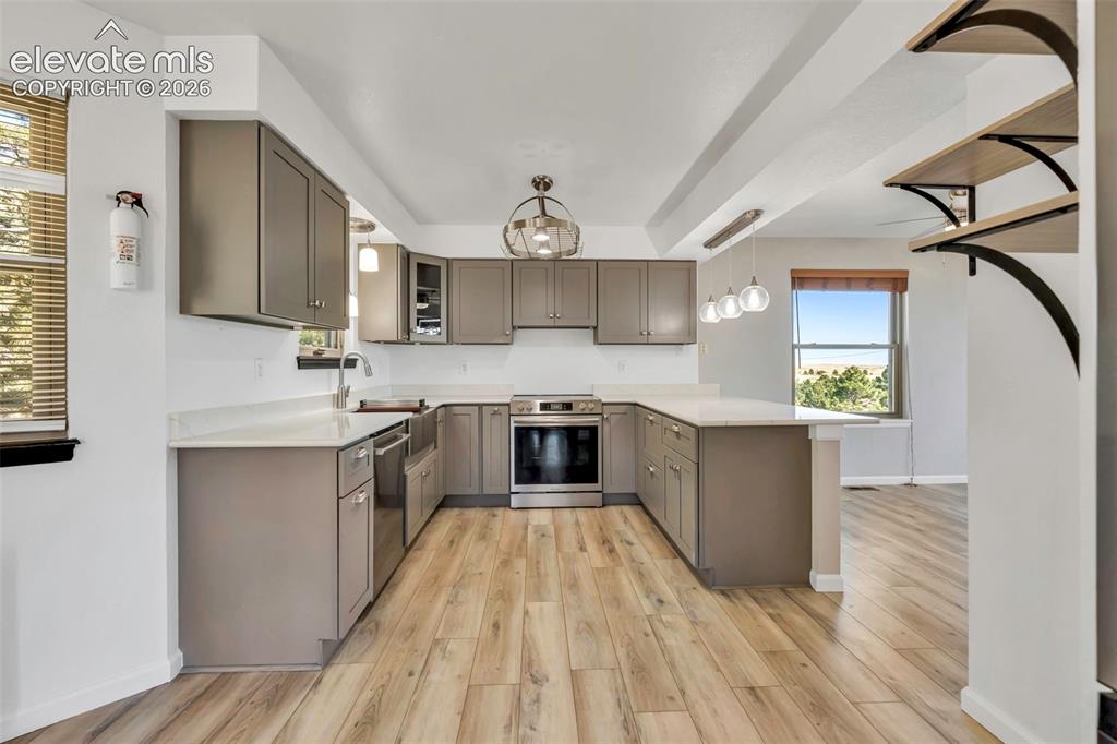 Image 22 of 47: From the new flooring to the kitchen update, there is nothing left to do bu