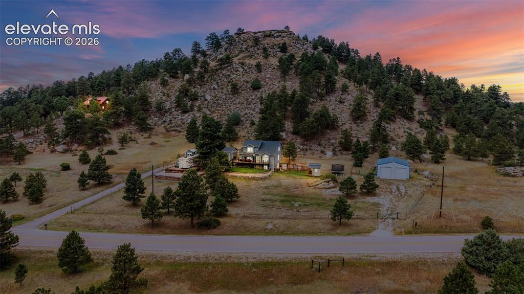 Image 5 of 47: Aerial view at dusk of this gorgeous Peyton Pines gem where quiet and tranq