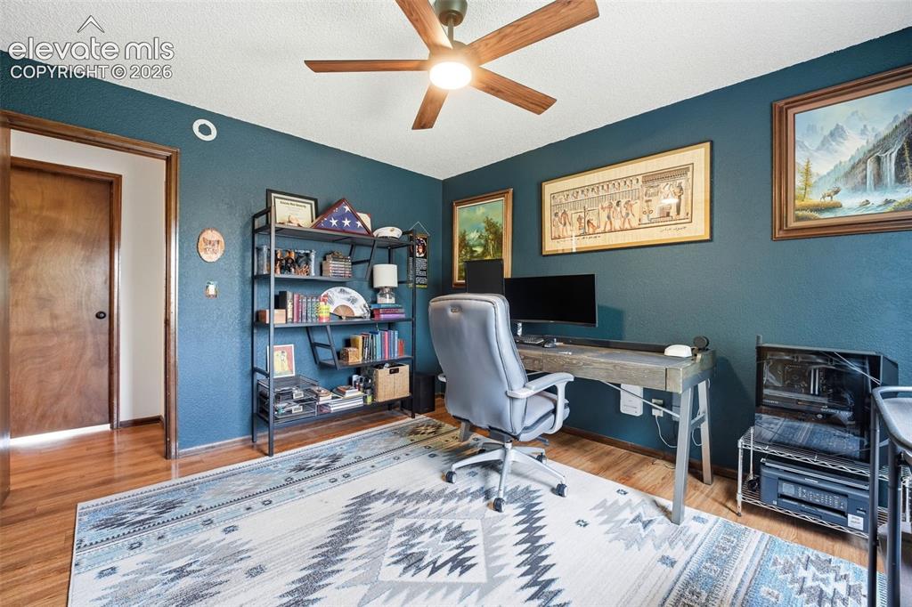 Image 24 of 42: Wood-finish flooring throughout