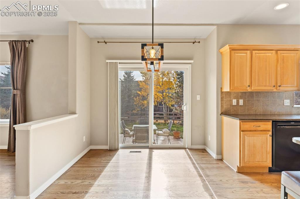 Image 11 of 34: Enjoy family meals in this spacious dining area AND entertain large gatheri