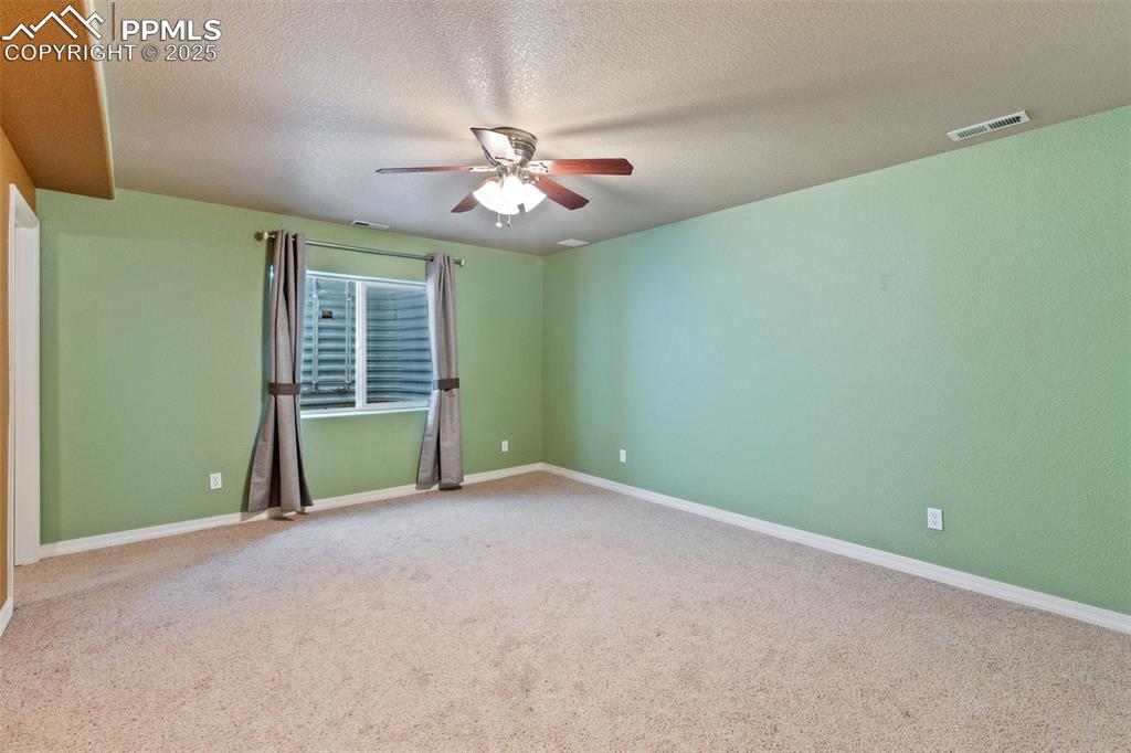 Image 30 of 34: Basement bedroom 4.