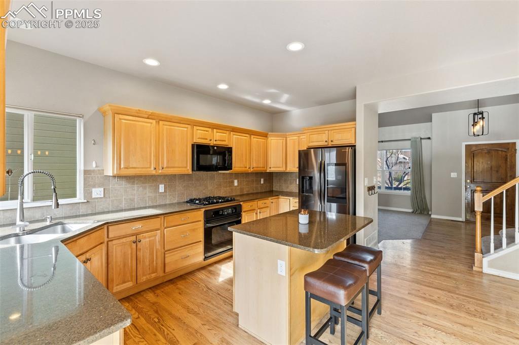 Image 8 of 36: All of the cooks in the family will enjoy this well-appointed kitchen with